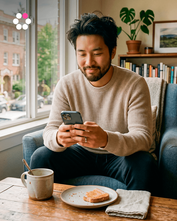 Person finishing a morning routine, looking calm and grounded, phone in hand