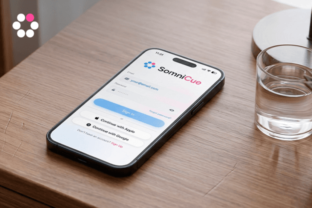 SomniCue product photo: phone running the app on a nightstand